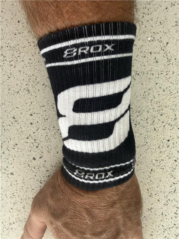 8ROX Performance Wristbands - large 8 design worn on the wrist